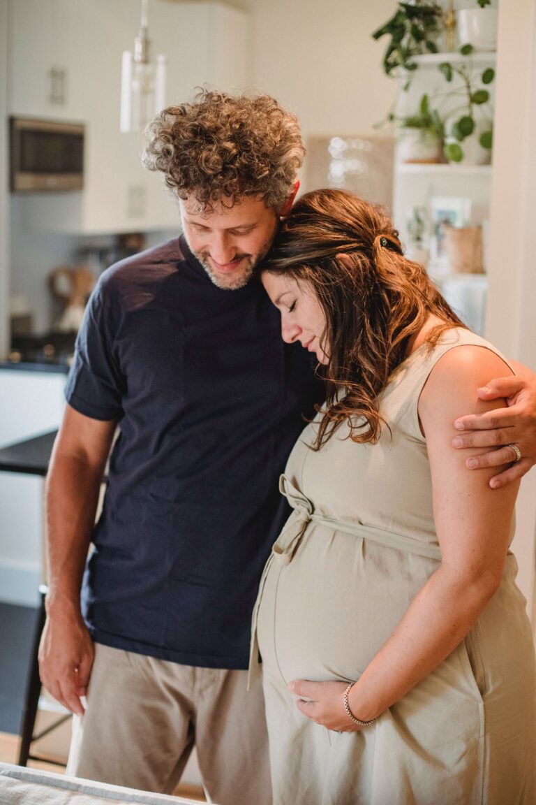 Loving couple embracing in apartment